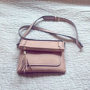 Pink purse with adjustable strap